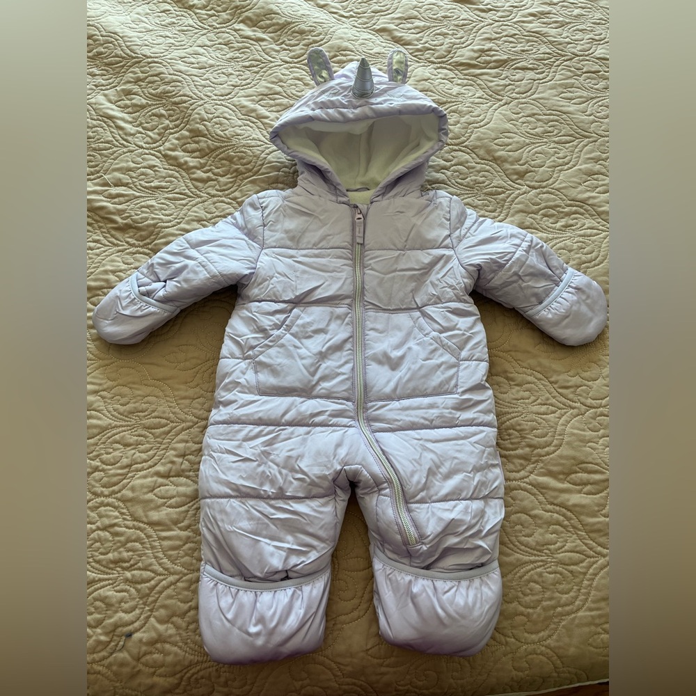 New Baby one piece coat. Never used. Size 6-9 months. Lavender color.